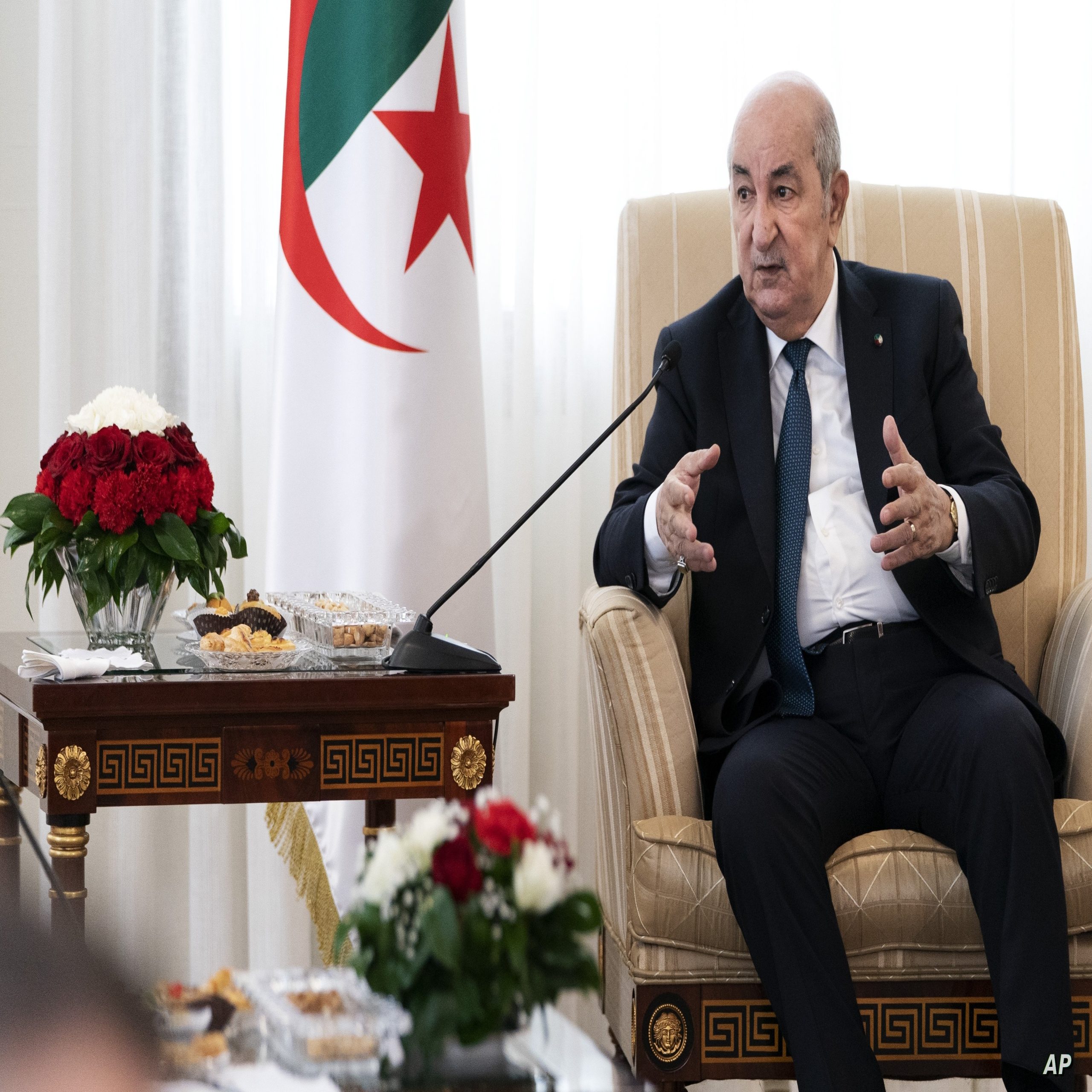 Algeria's President Abdelmadjid Tebboune, speaks for just under a half hour during the start of a meeting with U.S. Secretary of State Antony Blinken, Wednesday, March 30, 2022, at El Mouradia Palace, the President's official residence in Algiers, Algeria. (AP Photo/Jacquelyn Martin, Pool)